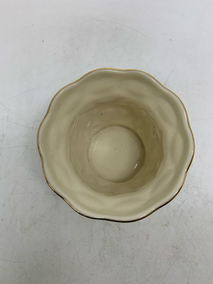 EMBOSSED TEA LIGHT HOLDER.