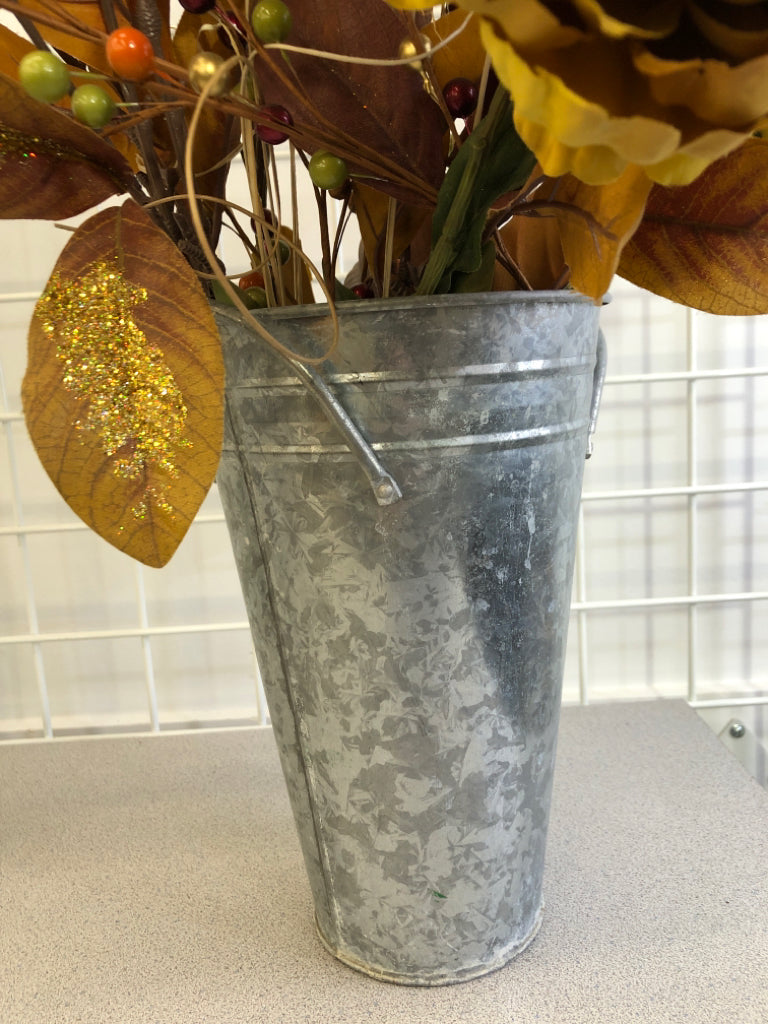ORANGE & GREEN FAUX FLORALS IN TIN BUCKET.