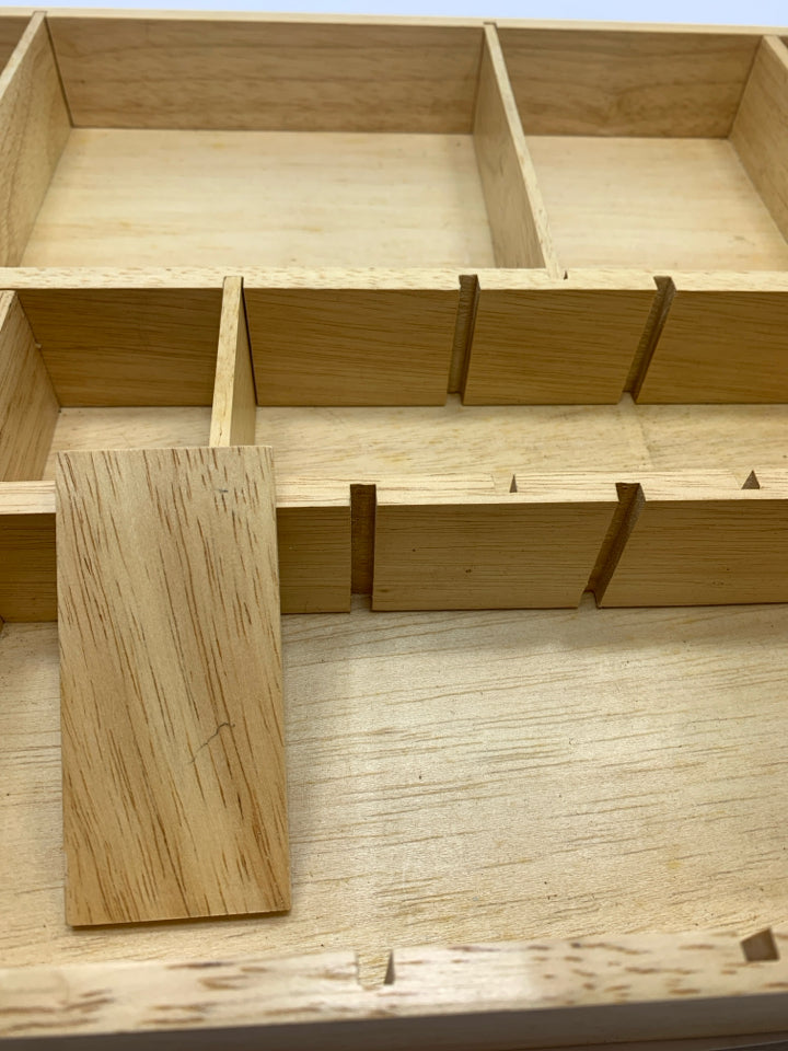 DIVIDED WOODEN UTENSIL STORAGE.
