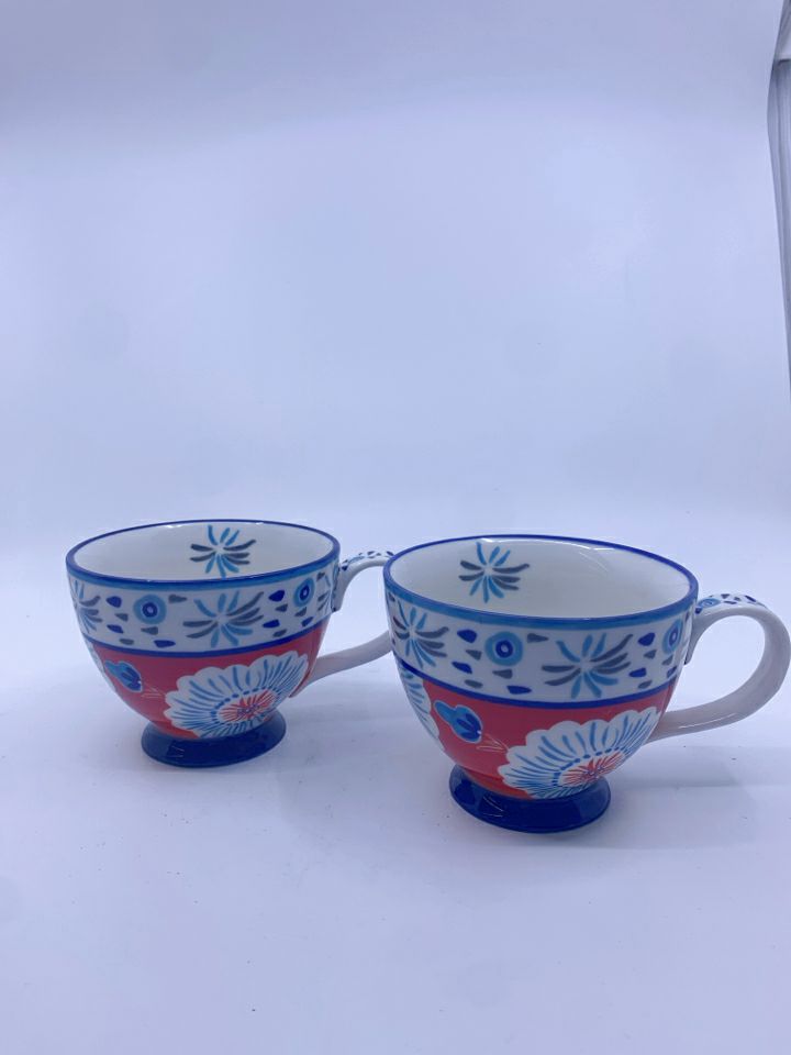 2 POTTERY STUDIO FLORAL MUGS.