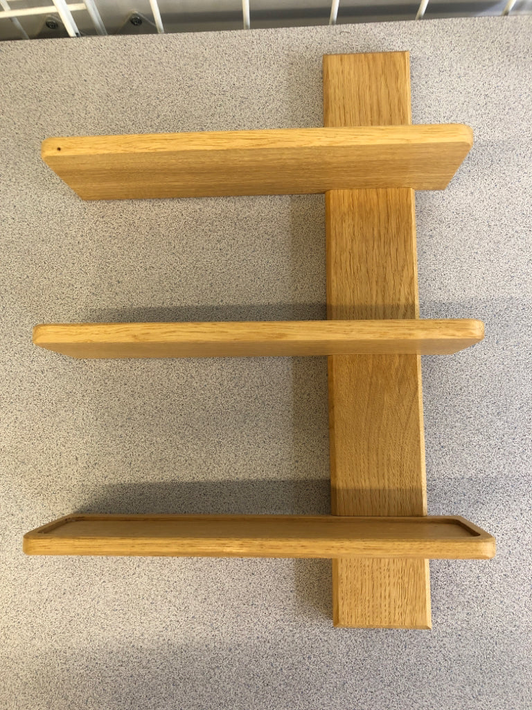 THREE SHELF WOOD WALL HANGING.