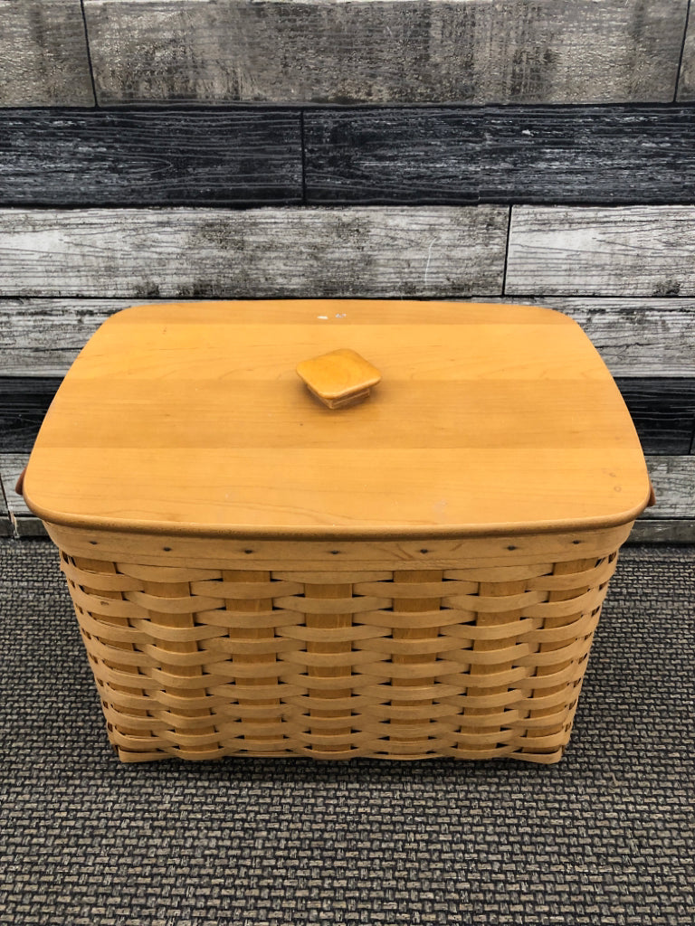 2013 LARGE SLANT BASKET  W/WOOD COVER, PLASTIC PROTECTOR, + LEATHER HANDLES.