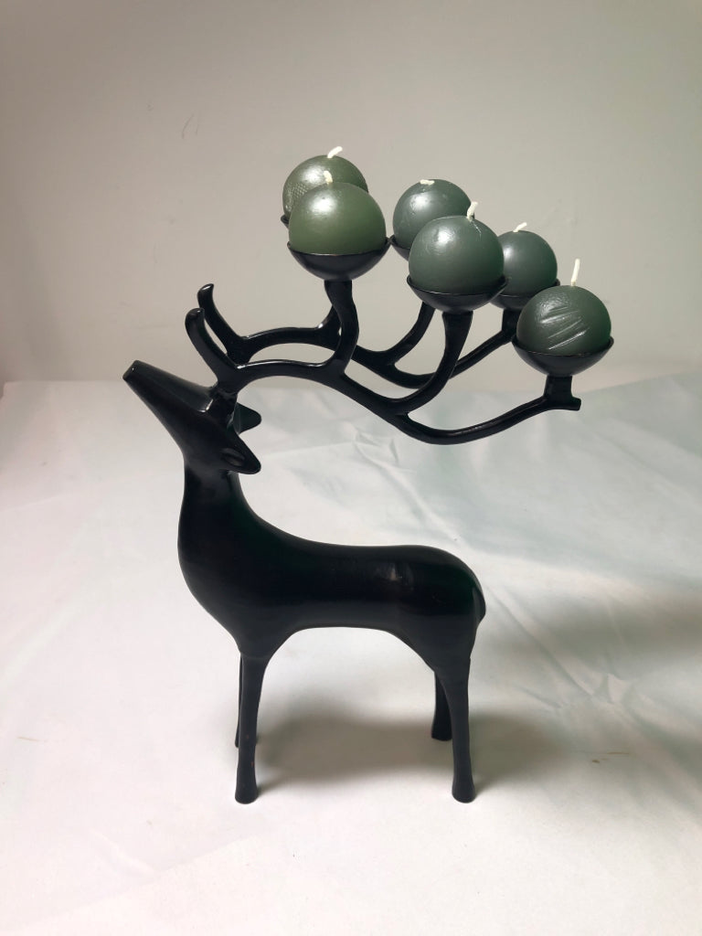 BLACK METAL DEER W/ 6 GREEN CIRCLE CANDLES ON ANTLERS.