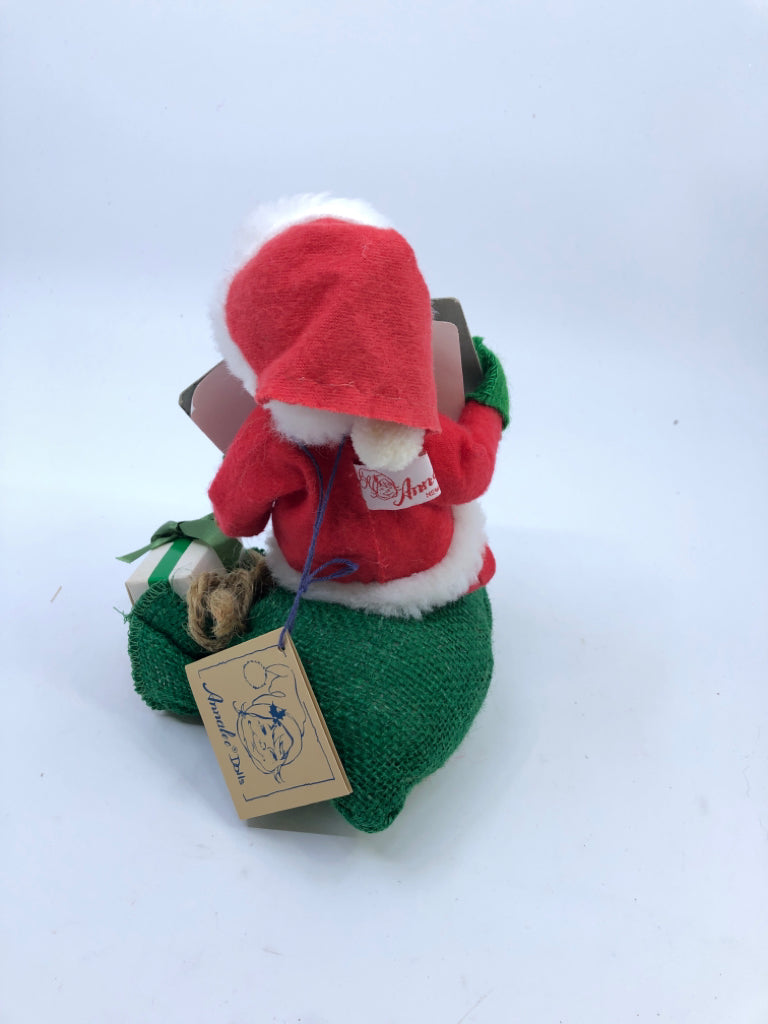 ANNA LEE SANTA HOLDING NAUGHTY NICE BOOK.