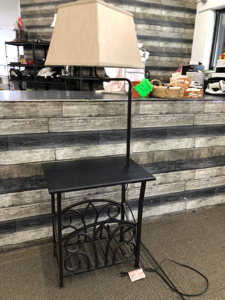 BLACK RECTANGLE SIDE TABLE W BOTTOM STORAGE AND ATTACHED LAMP.