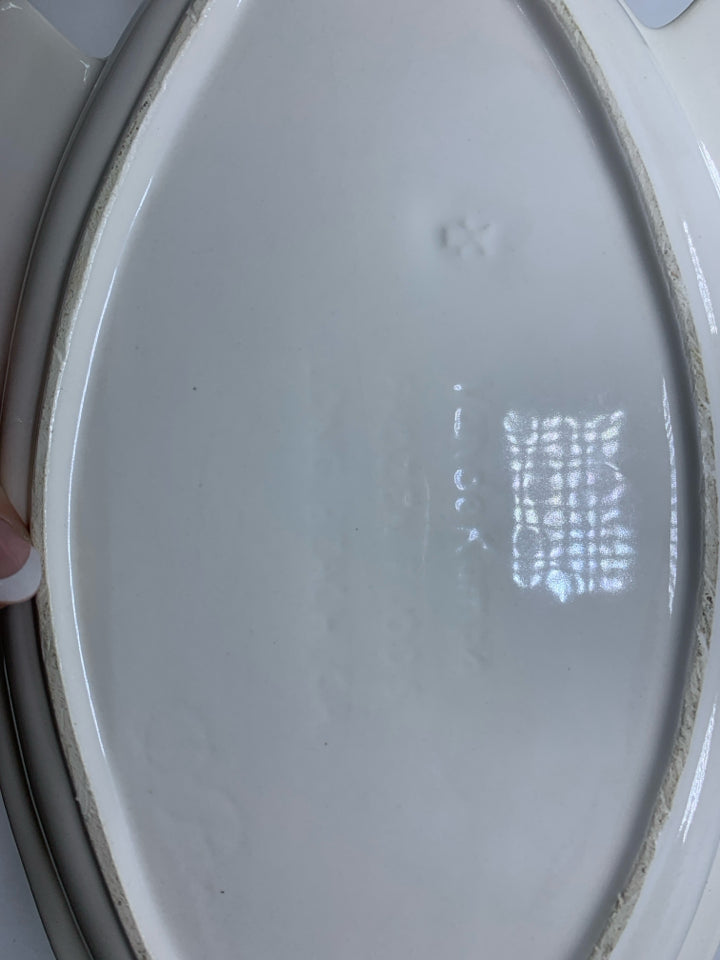 CREAM FISH SHAPED SERVING SHALLOW BOWL.