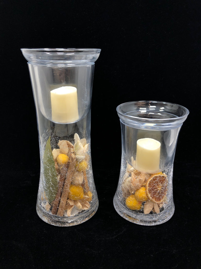 2 POTPOURRI HURRICANE LED CANDLE HOLDERS.