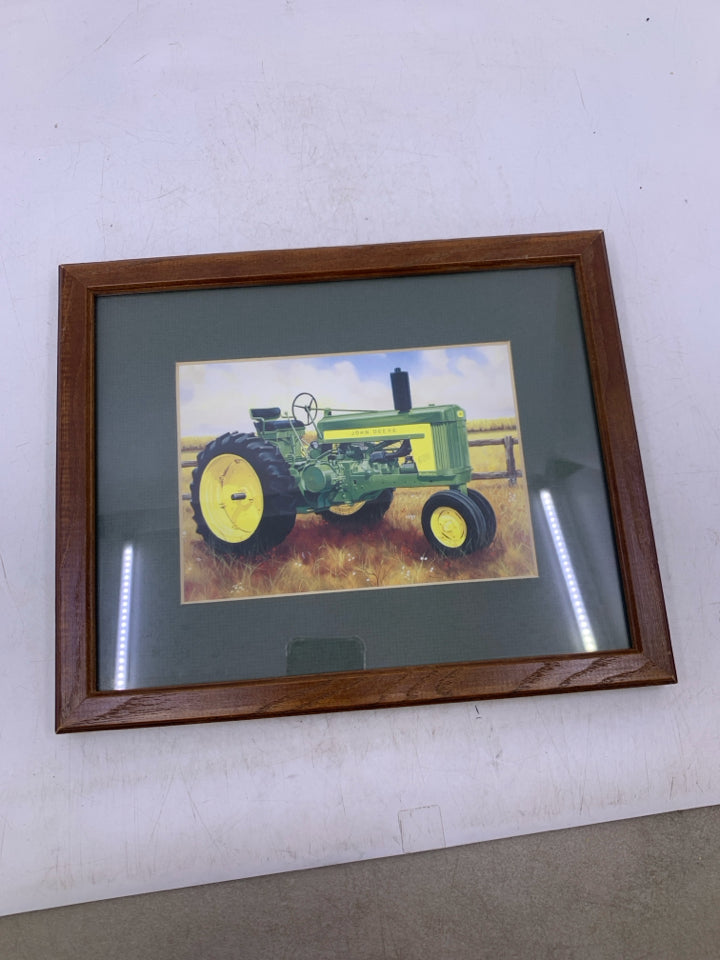 JOHN DEER TRACTOR IN BROWN FRAME.