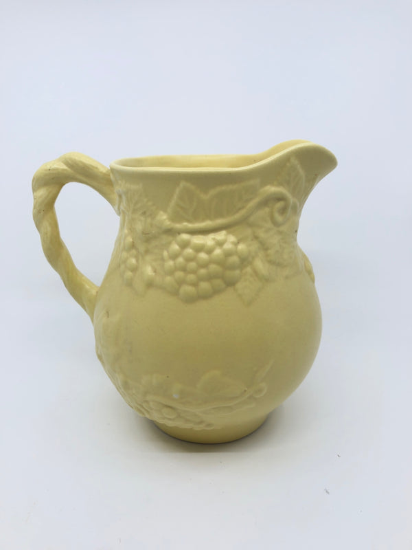 YELLOW EMBOSSED MATTE PITCHER.