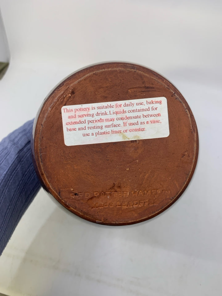 CRACKLE DESIGN W/ YELLOW DETAIL IN CENTER PITCHER.