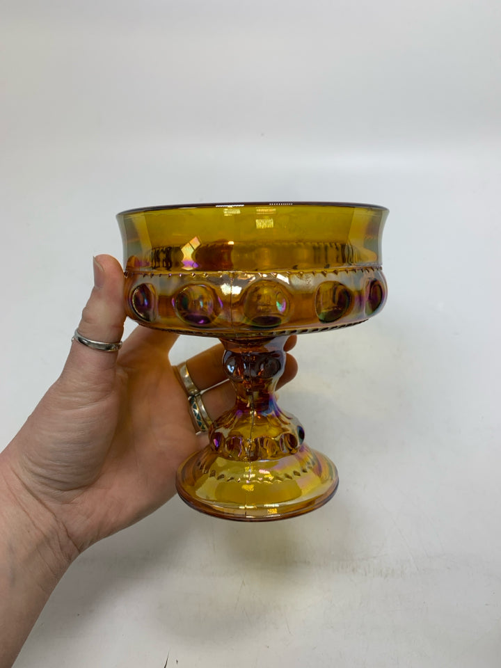 FOOTED AMBER IRIDESCENT GLASS W/ THUMB PRINT.
