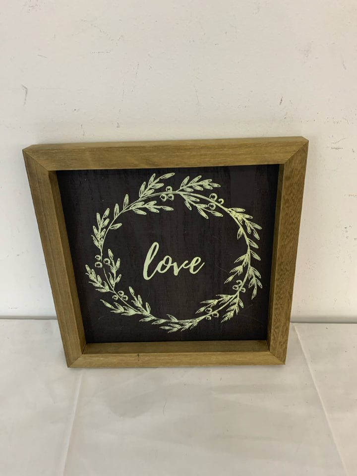 LOVE WALL HANGING IN WOOD FRAME.