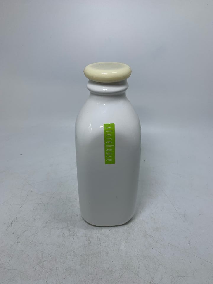 WHITE CERAMIC MILK BOTTLE W/ CAP.