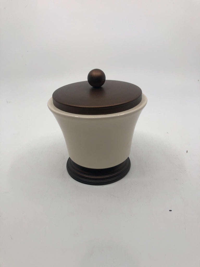 SMALL CREAM AND METAL CANISTER W LID.