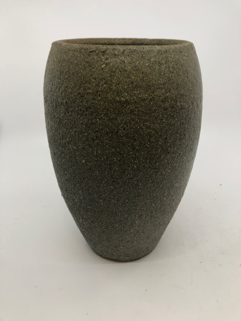 TEXTURED BROWN VASE.