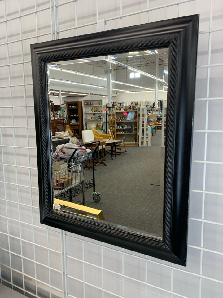 BLACK WALL MIRROR.