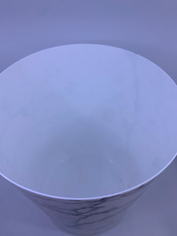 WHITE FAUX MARBLE TRASH CAN.