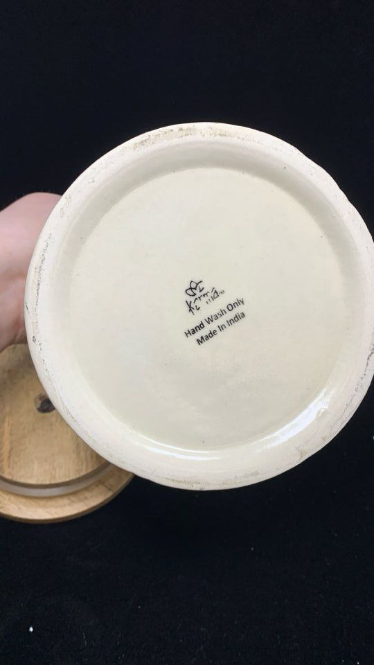 CERAMIC FACE PAINTED CANISTER W/BAMBOO LID.