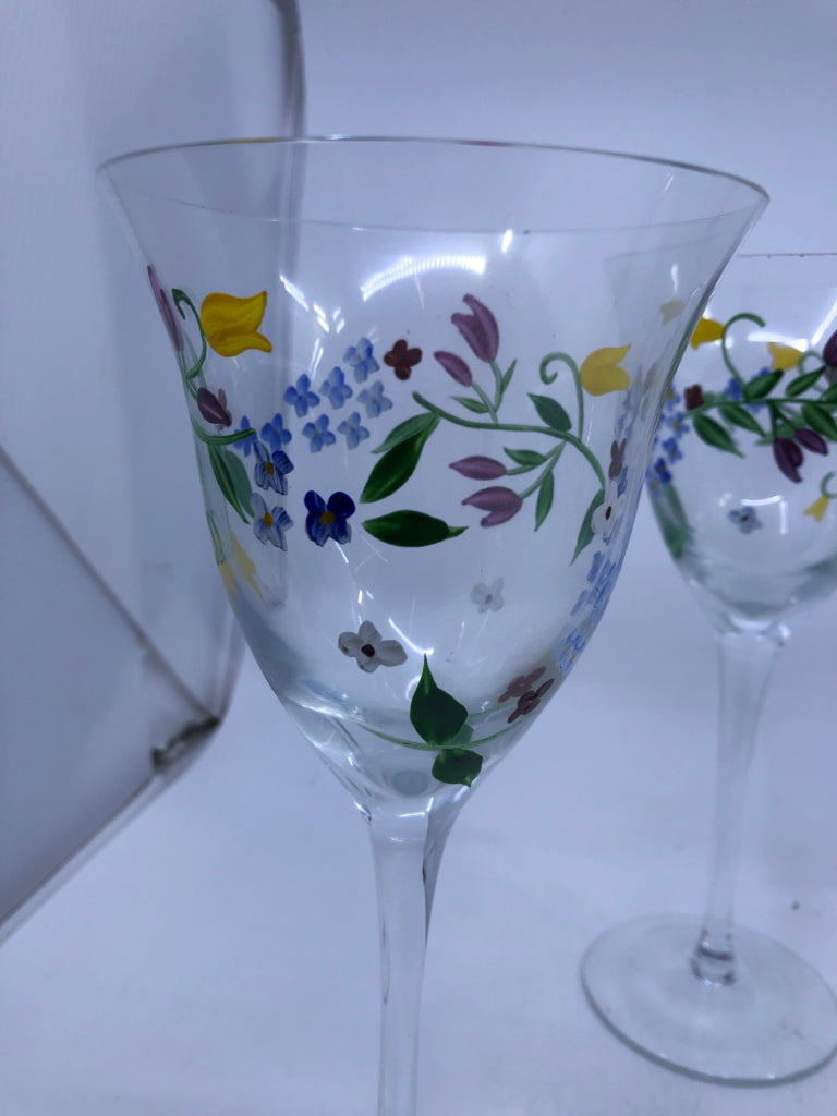 4 TALL FLORAL PAINTED WINE GLASSES.