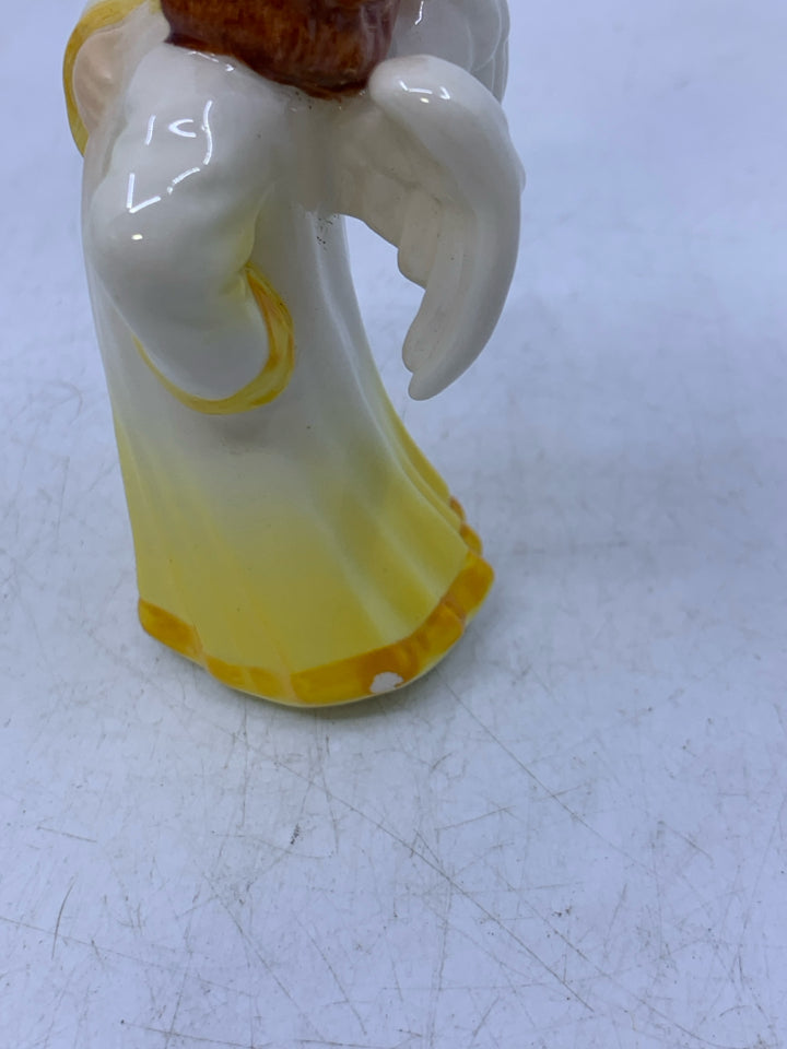 ANGEL IN YELLOW DRESS RED HAIR.