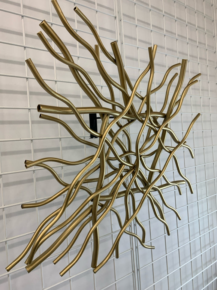 BRANCH-INSPIRED GOLD WALL SCULPTURE.