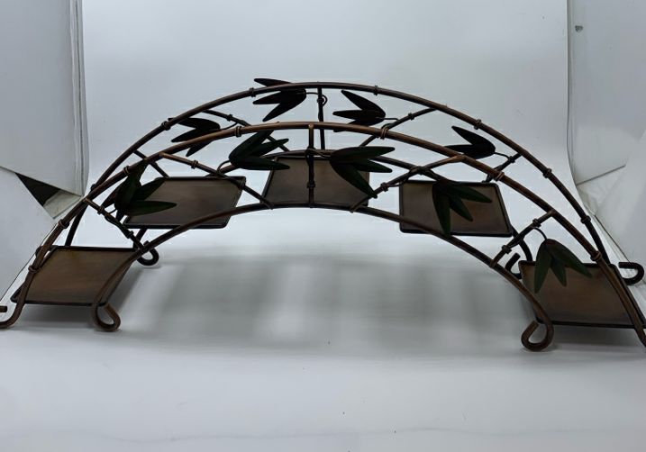5 TIER BROWN METAL CANDLE STAND W/LEAVES.