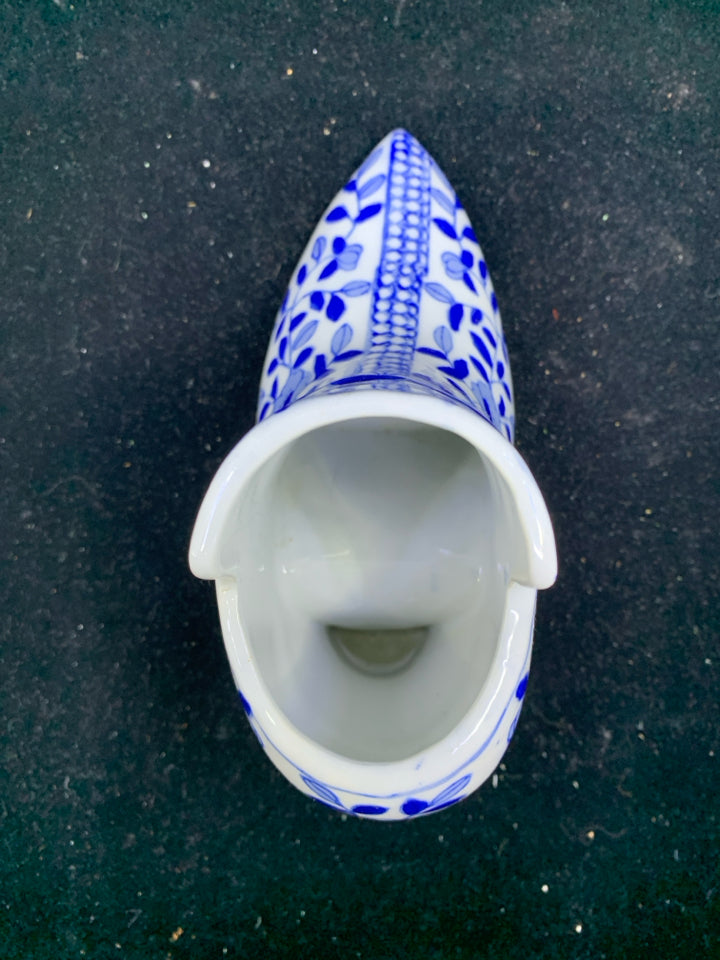 BLUE AND WHITE SHOE PLANTER.