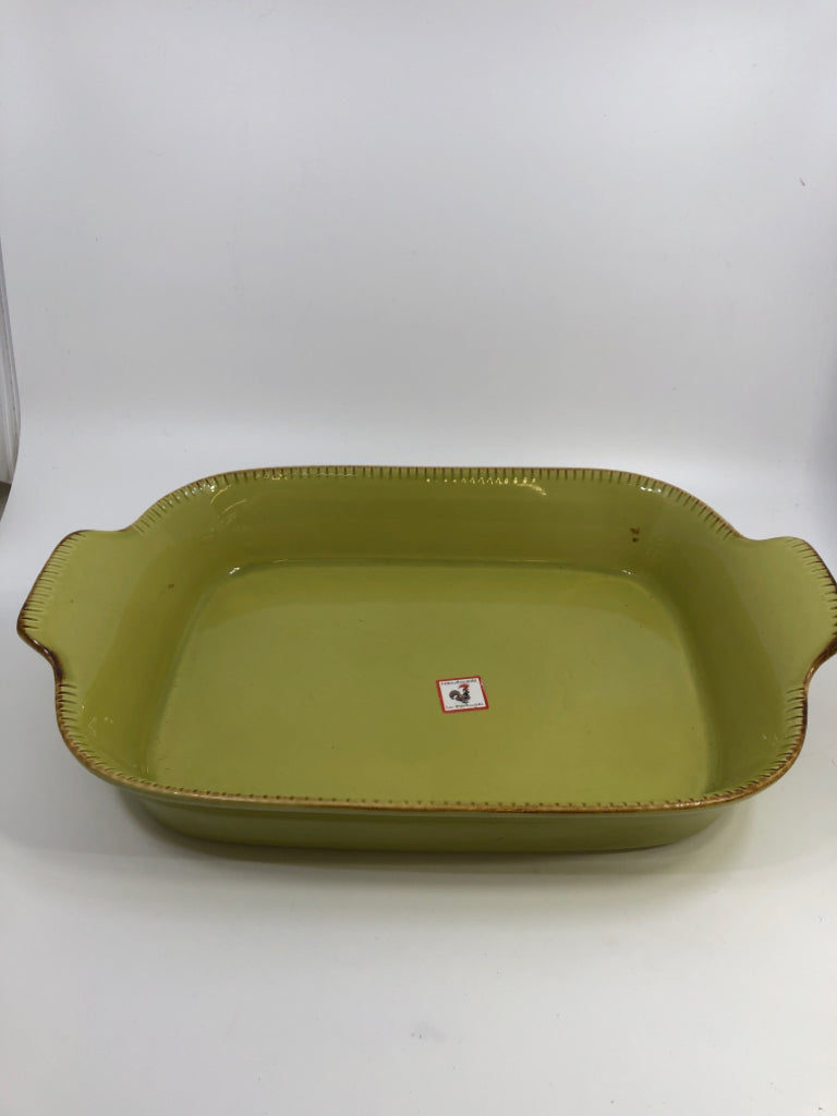 GREEN STONEWARE DISH GRESTEL W/ EMBOSSED LINES ON EDGE.
