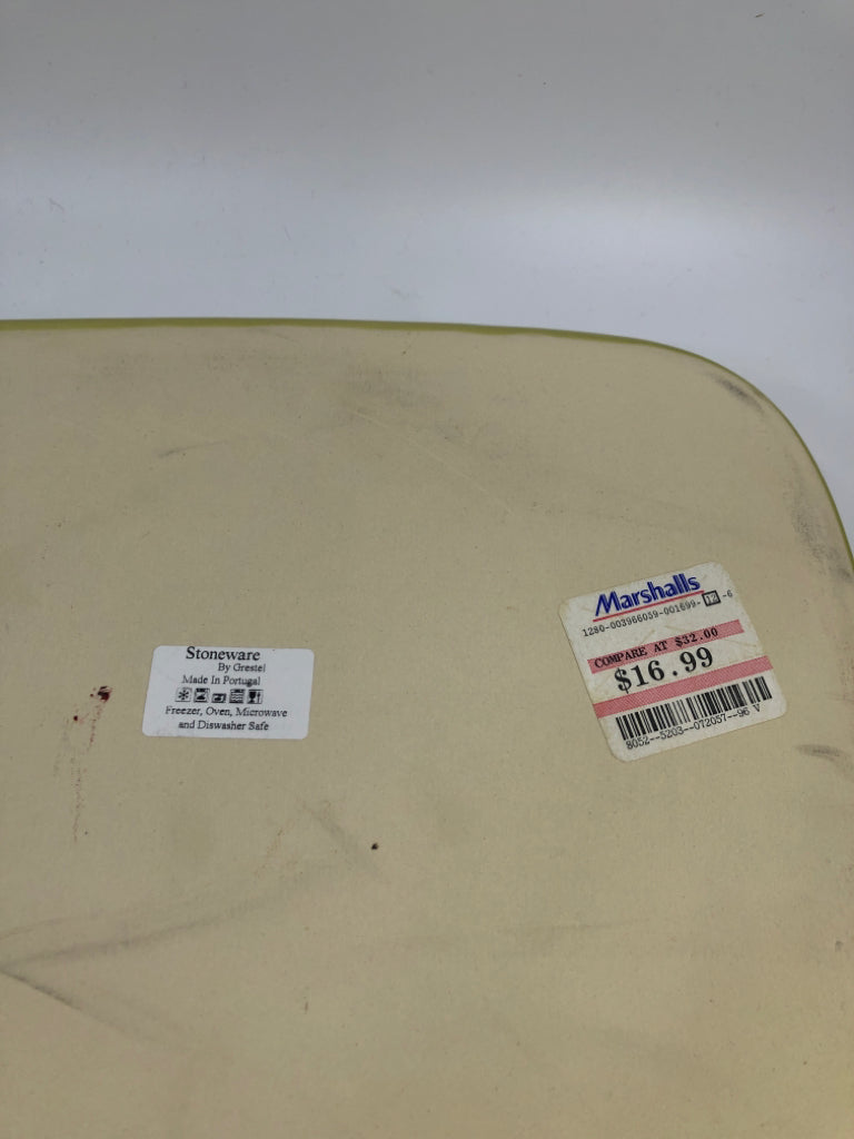 GREEN STONEWARE DISH GRESTEL W/ EMBOSSED LINES ON EDGE.