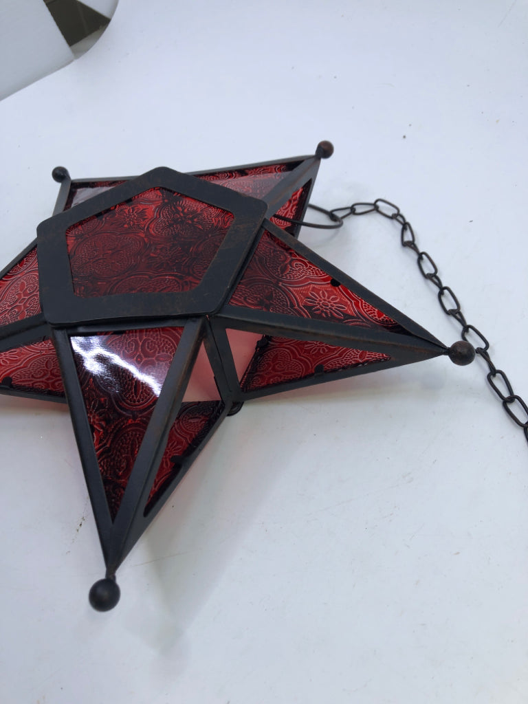 GLASS STAR TEA LIGHT HOLDER.