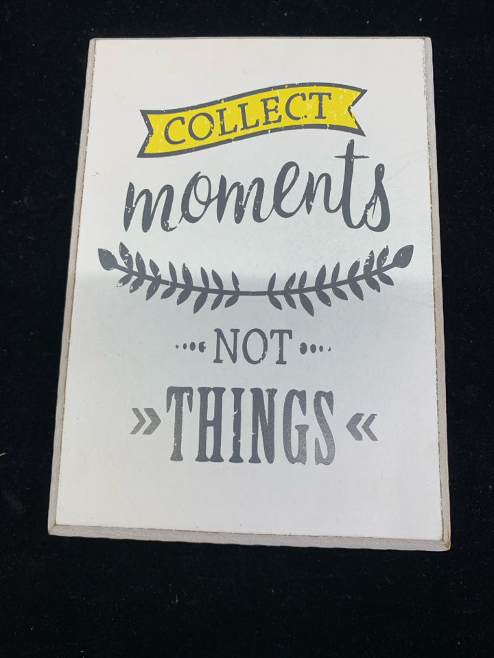 COLLECT MOMENTS WHITE SIGN.