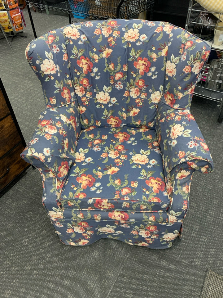 BLUE FLORAL ACCENT CHAIR W ARM SLIPS.