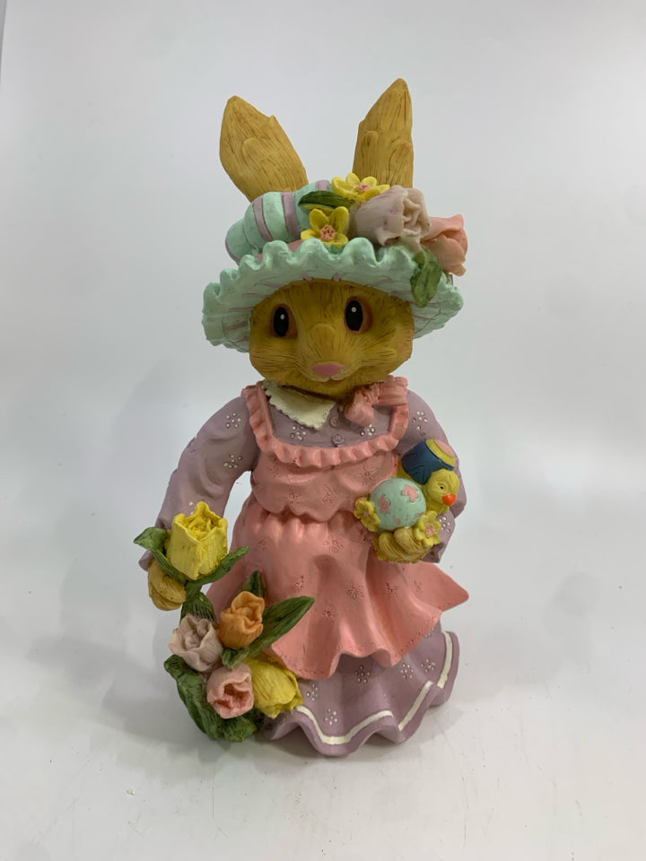 MRS BUNNY IN FLOWER HAT HOLDING DUCK.