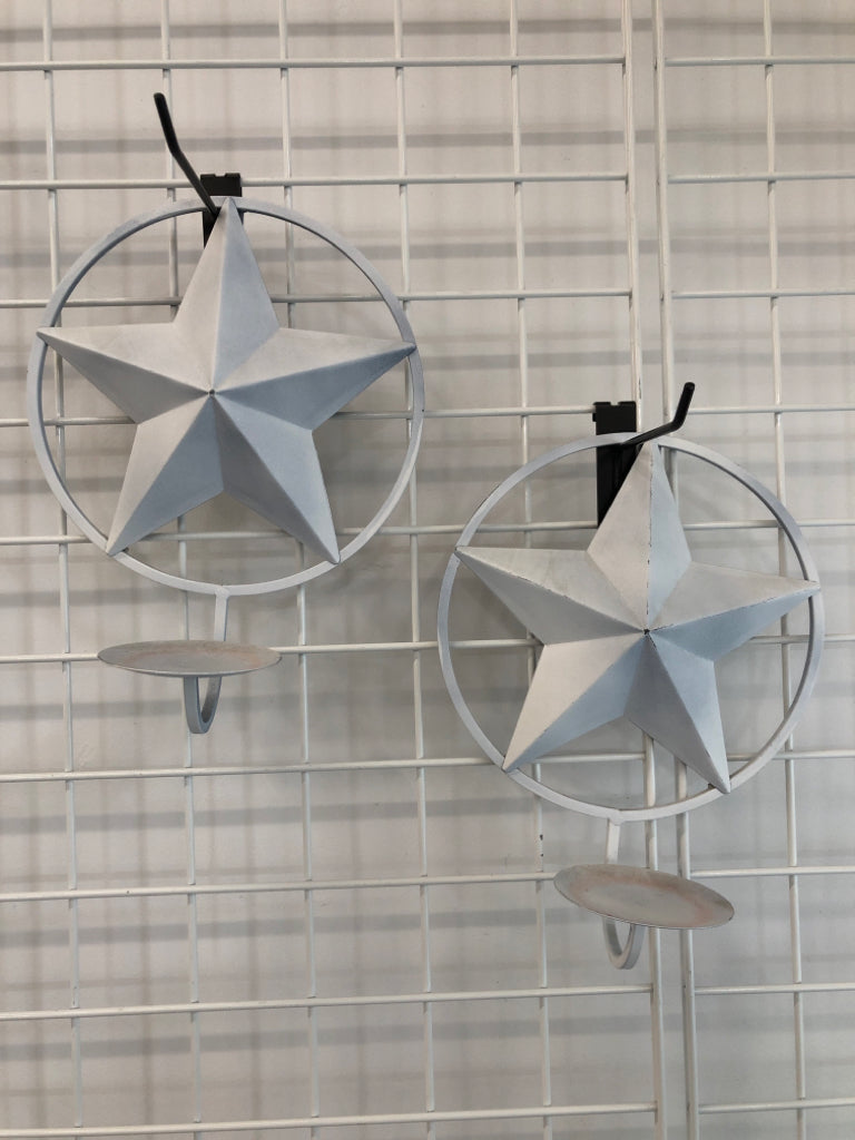 2 WHITE STAR METAL CANDLE HOLDER.