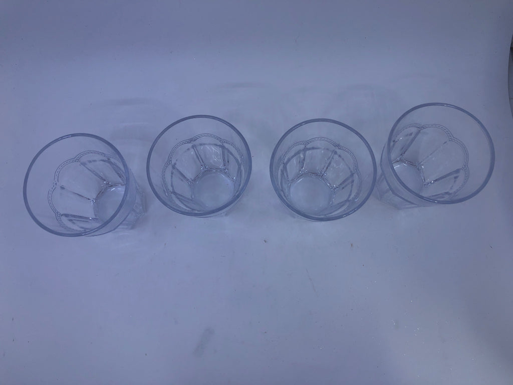 4 JUICE GLASSES W/ BEADED SCALLOP DETAIL.