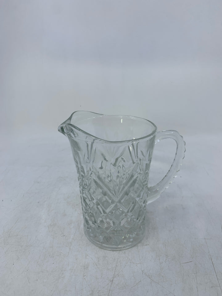 CUT GLASS PITCHER TEXTURED HANDLE.