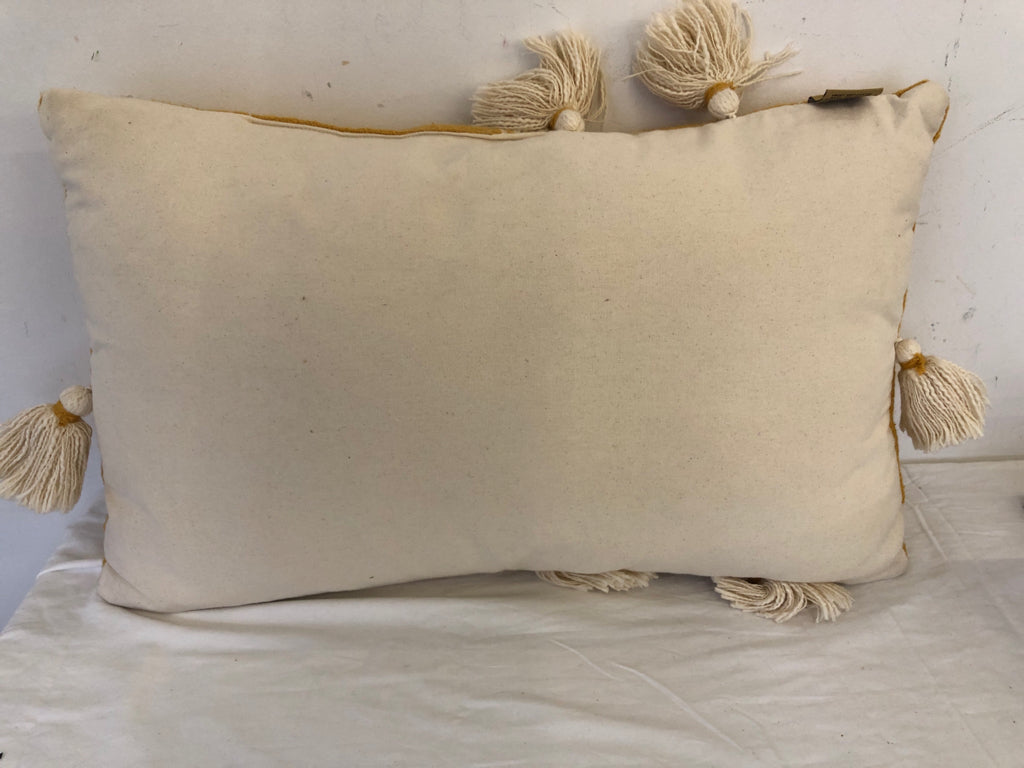 RECTANGLE YELLOW AND CREAM PILLOW W TASSELS.