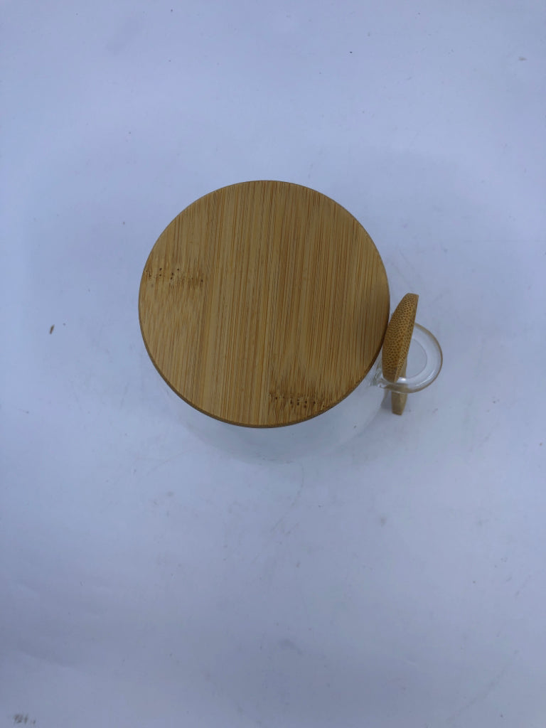 GLASS EMPTY JAR W WOOD LID AND SPOON.