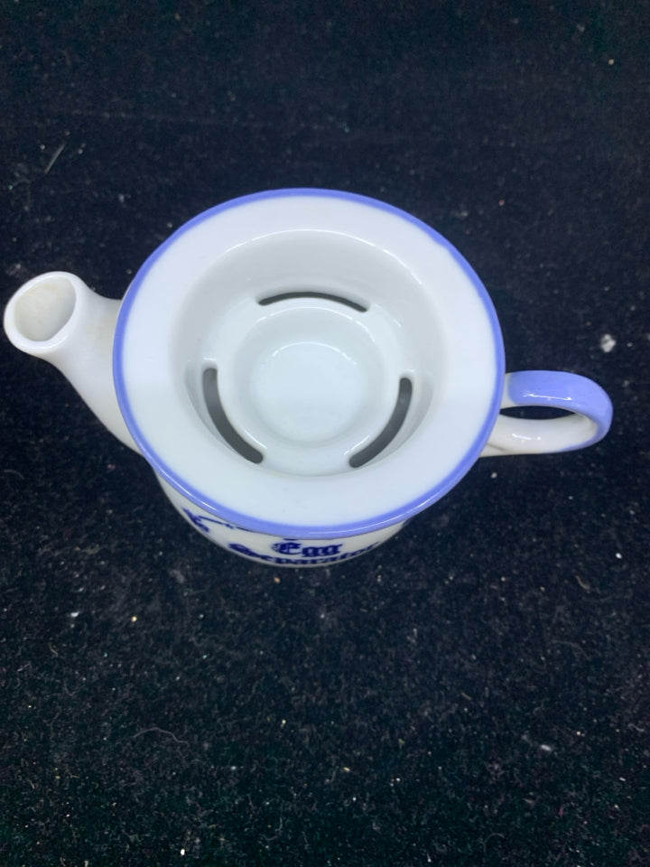 VTG BLUE AND WHITE EGG SEPERATER.