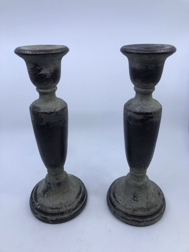 2 RUSTIC TAPER CANDLESTICK HOLDERS.