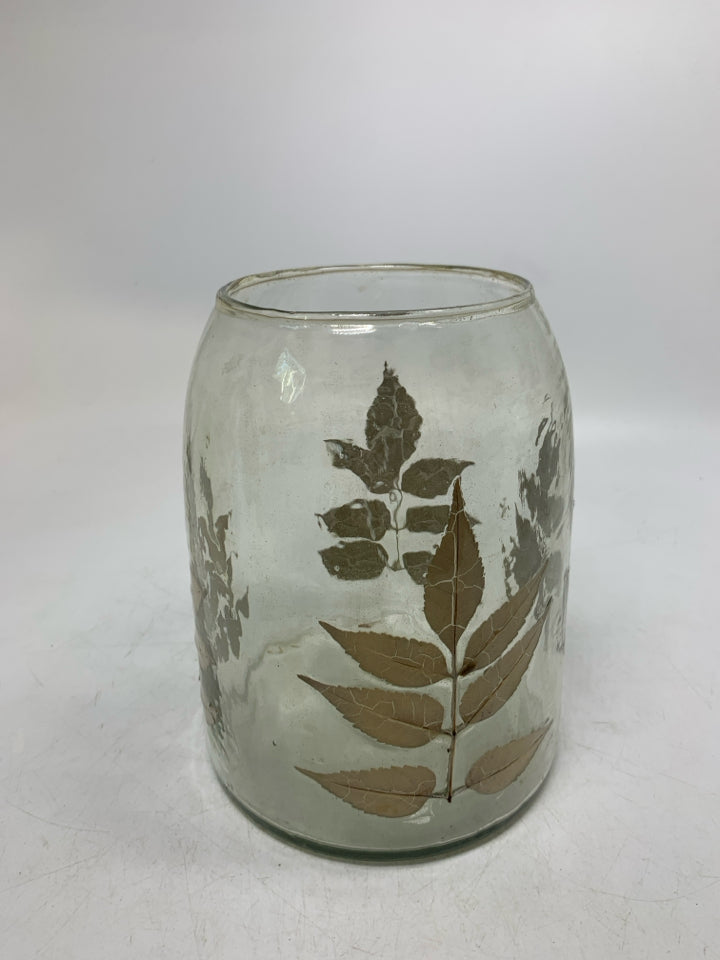 TEXTURED GLASS W/ IMPRINTED LEAVES PILLAR CANDLE HOLDER.