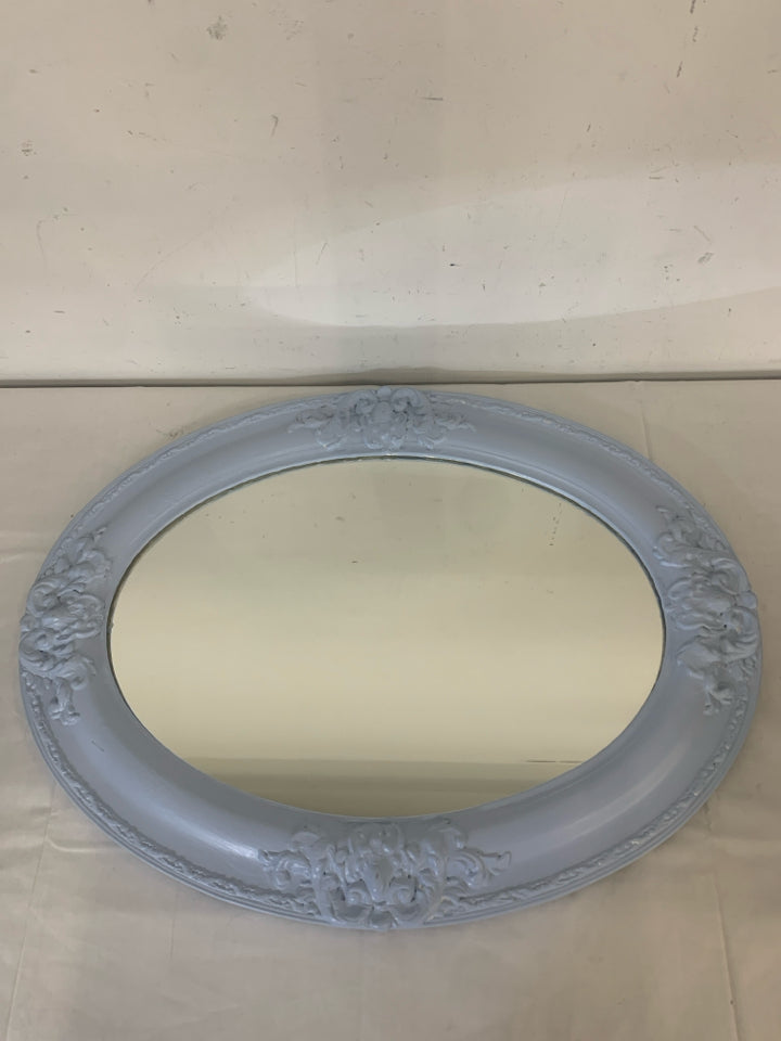 LIGHT BLUE PAINTED OVAL MIRROR EMBOSSED DESIGNS.