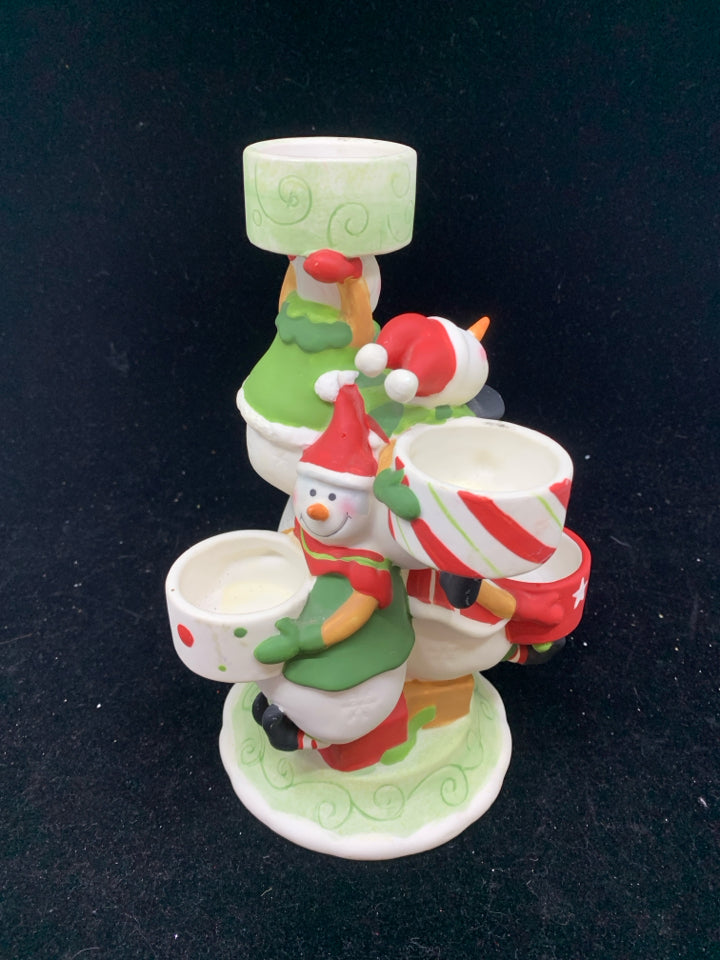 CERAMIC PILE OF SNOWMEN TEA LIGHT CANDLE HOLDER.