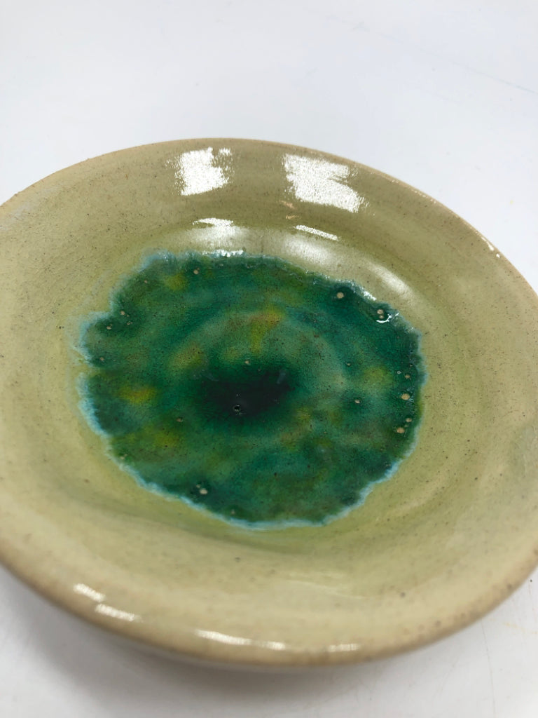 TAN AND GREEN GLAZE POTTERY DISH.