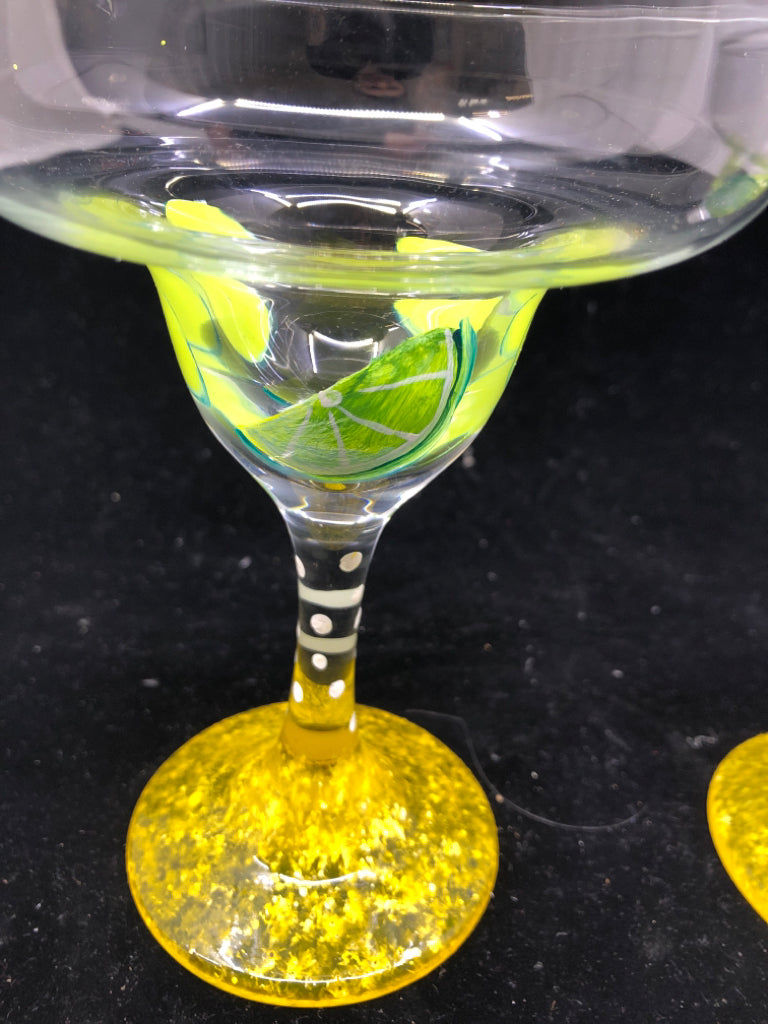 2 MARGARITA GLASSES W/ YELLOW STEM + PAINTED LIMES.