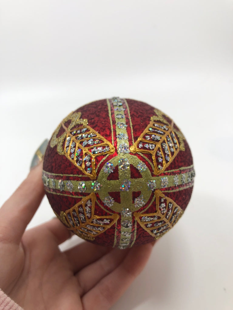 RED & GOLD EGG SHAPED ORNAMENT.