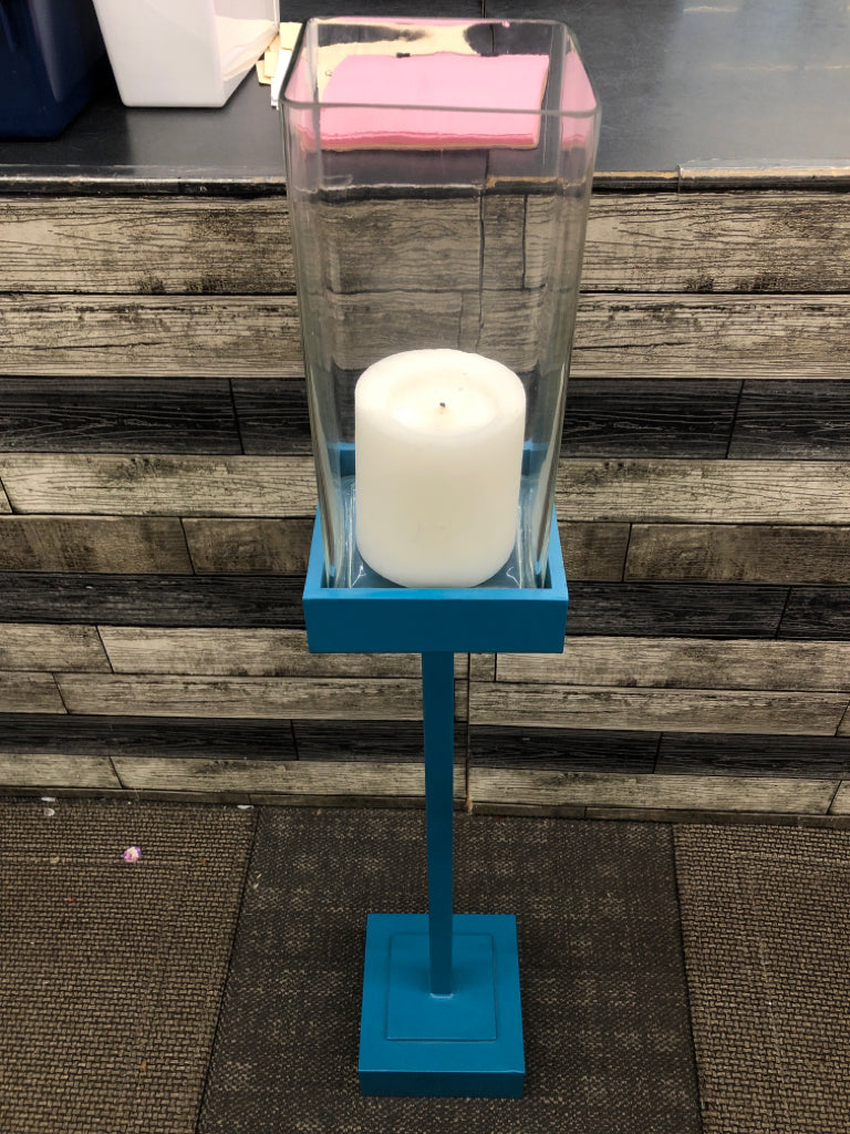 MEDIUM BLUE SQUARE BASE CANDLE HOLDER W/CLEAR GLASS TOP.