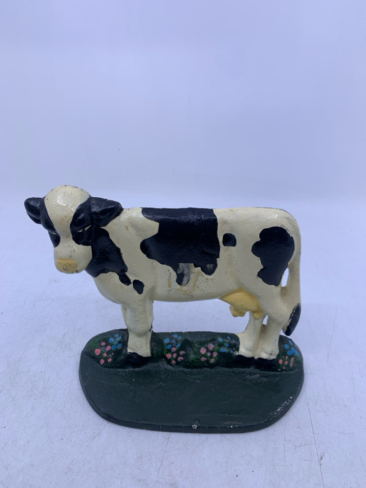 HEAVY METAL COW DOOR STOP.