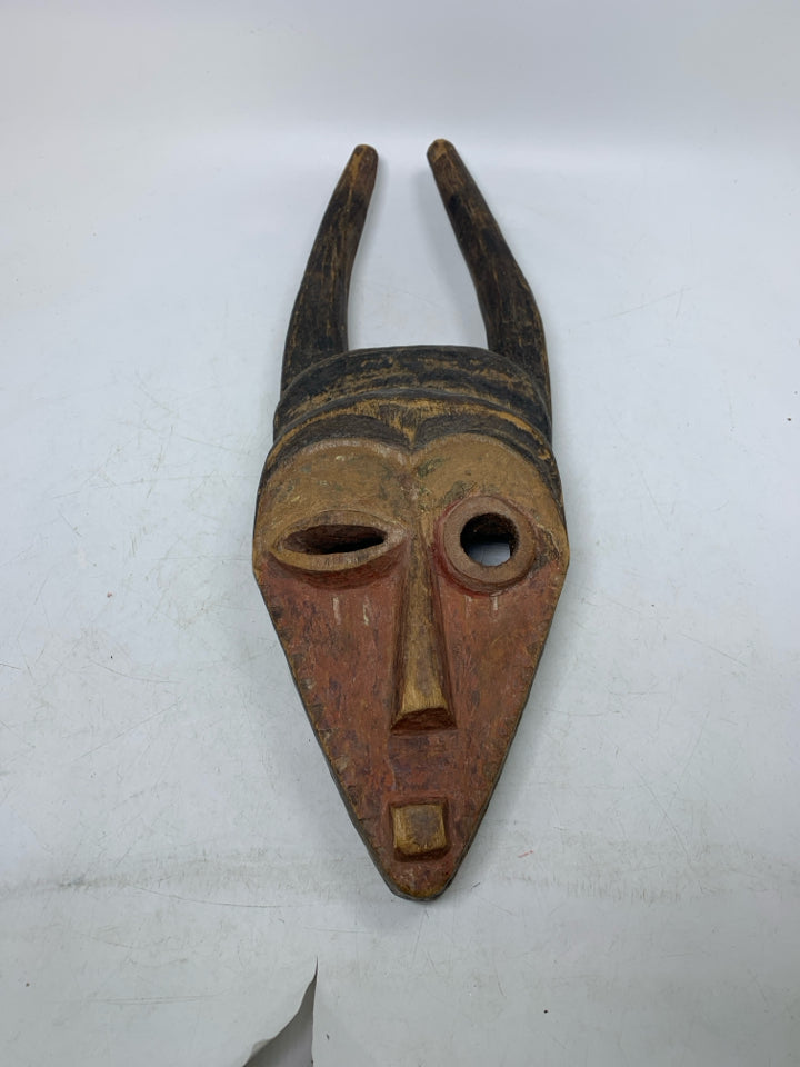 WOOD CARVED WINKING MASK W/ POINTED EARS.