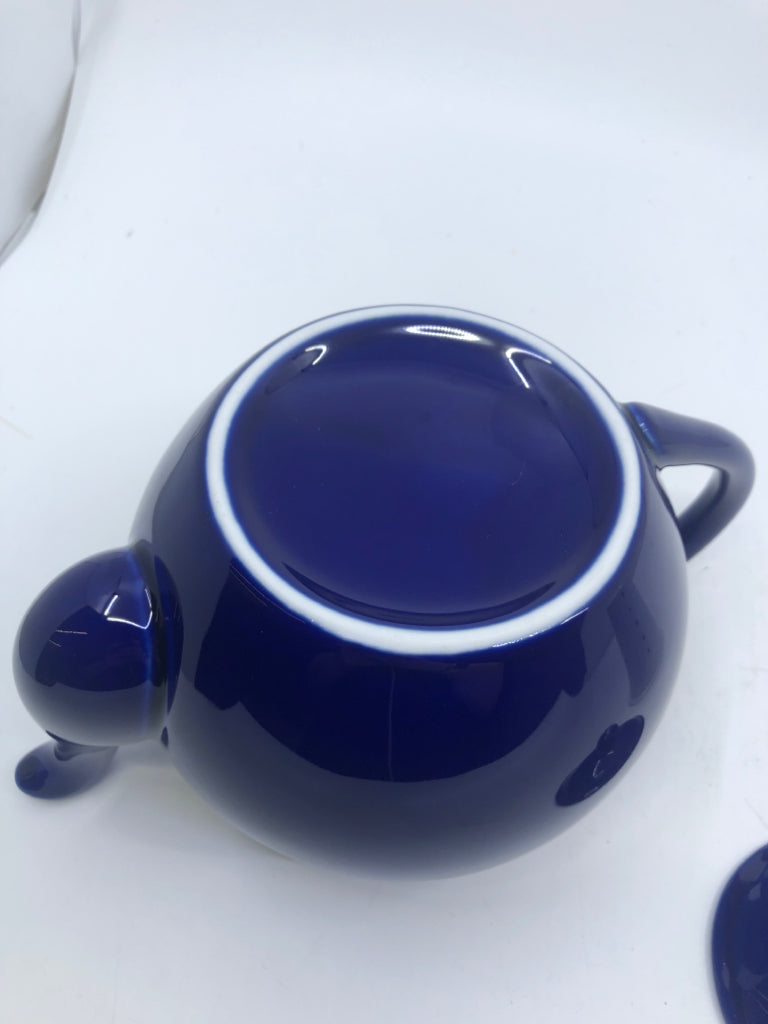 BLUE TEAPOT WITH CERAMIC INFUSER.